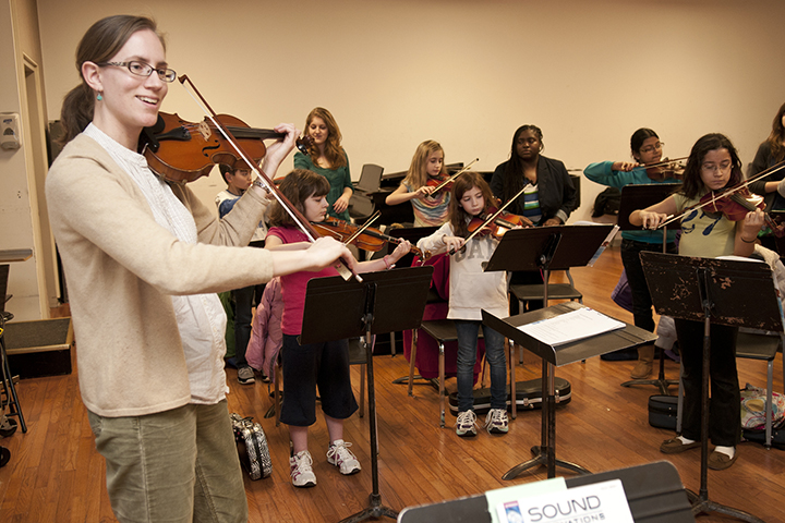 Master teacher Katherine Lewis leads String Project class.