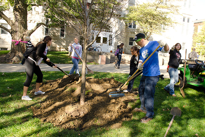 Students at An Arbor Day tree planting event