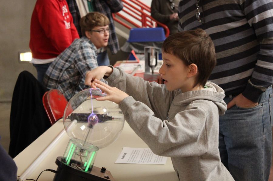 Child participates in Family Science Day