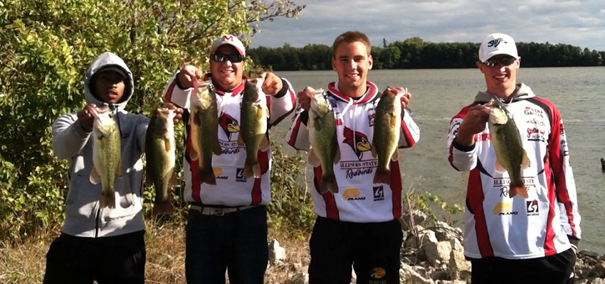 bass fishing team holds their catch