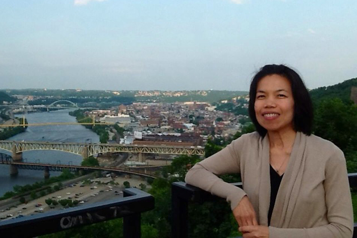 Yuwadee Viriyangkura overlooking downtown Pittsburgh at the 2013 American Association on Intellectual and Developmental Disabilities (AAIDD).