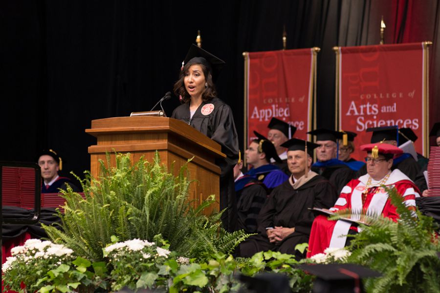 Yesenia Rodriguez speaks during the College of Arts and Sciences spring commencement