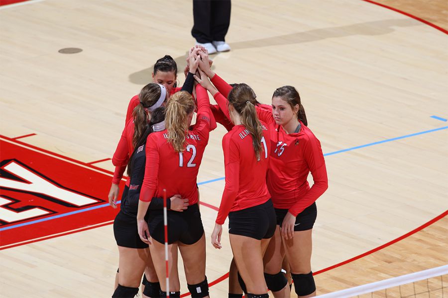 Redbird volleyball players on the court