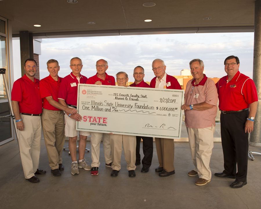 Emeriti faculty with large check