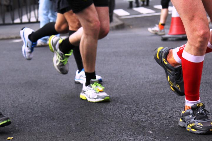 Photo of people's legs while they are running