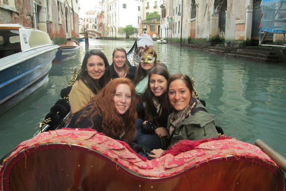 Lauren Vahldick on a boat in Venice with other students