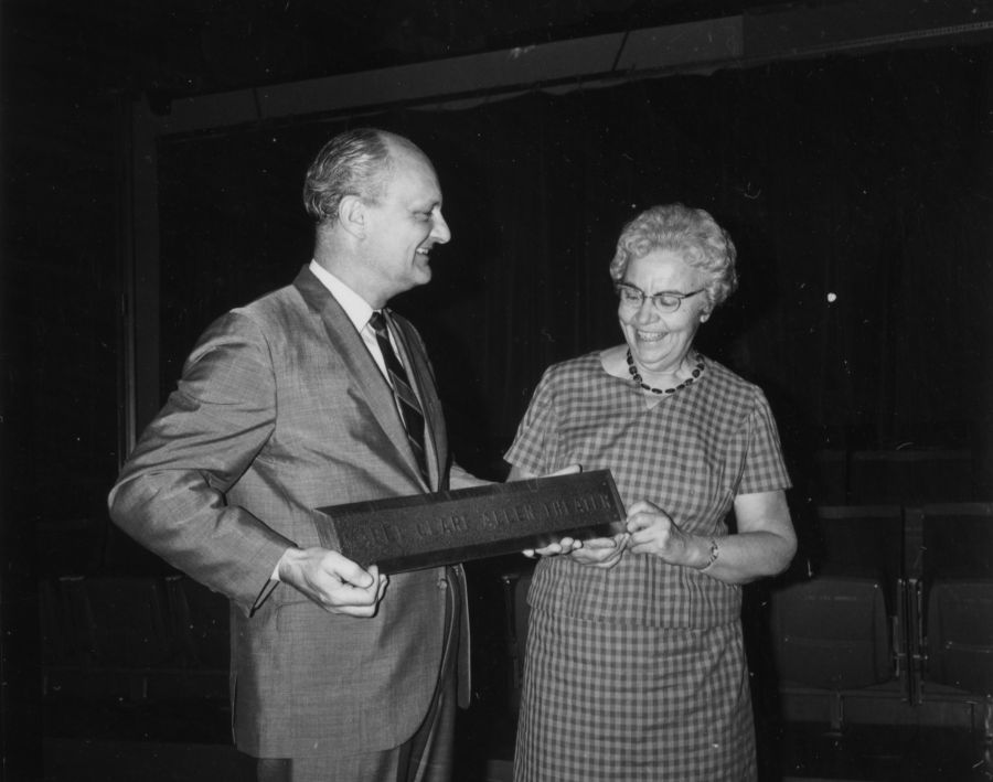 Mabel Clare Allen receives a plaque