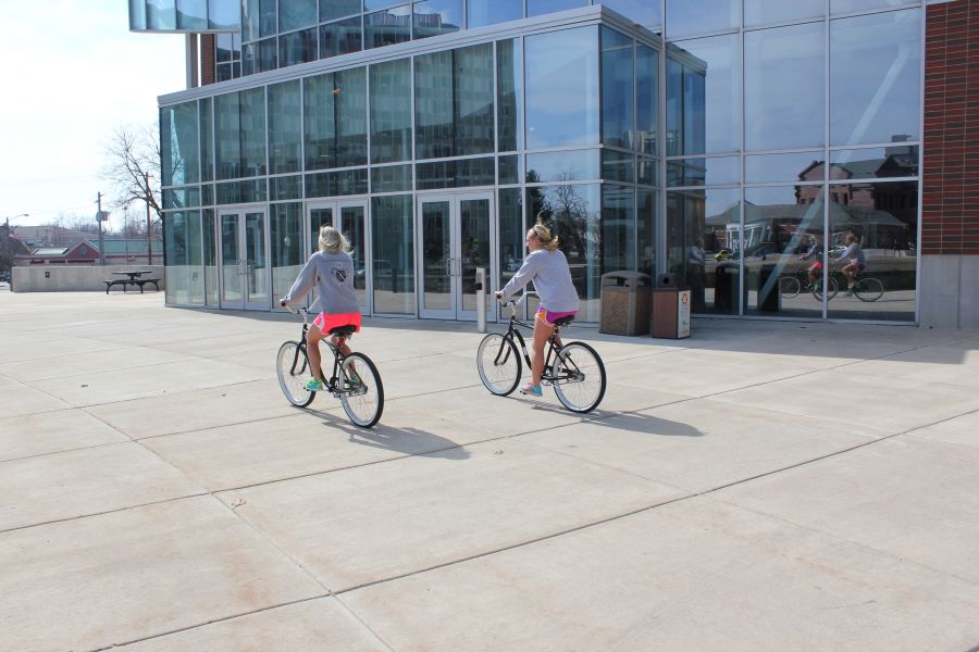 Students ride bikes near SFC