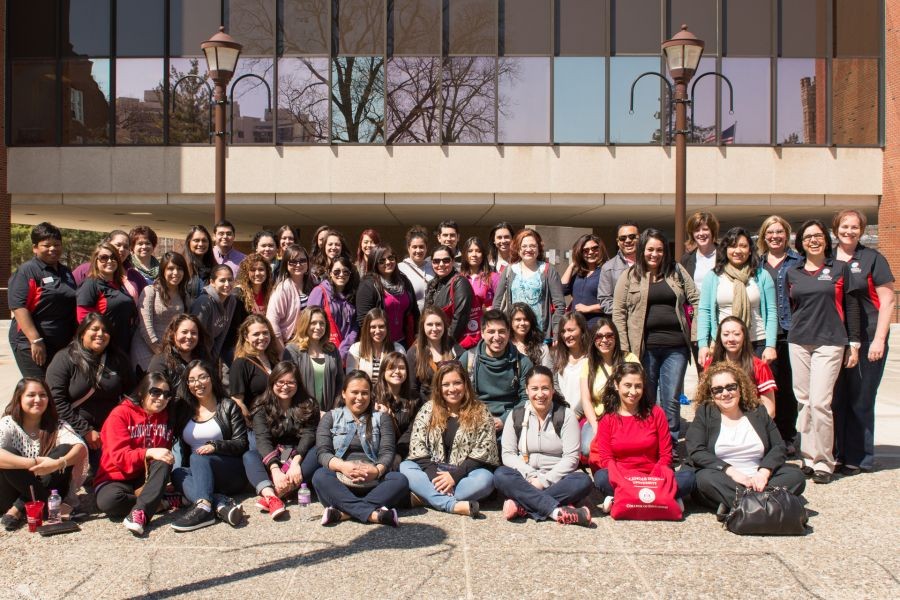 Group photo of the off-campus cohorts of transitioning paraprofessionals who are working toward earning their teaching degrees through one of the College of Education's three grant programs: TPT, TPTEL, and TPI-U46.