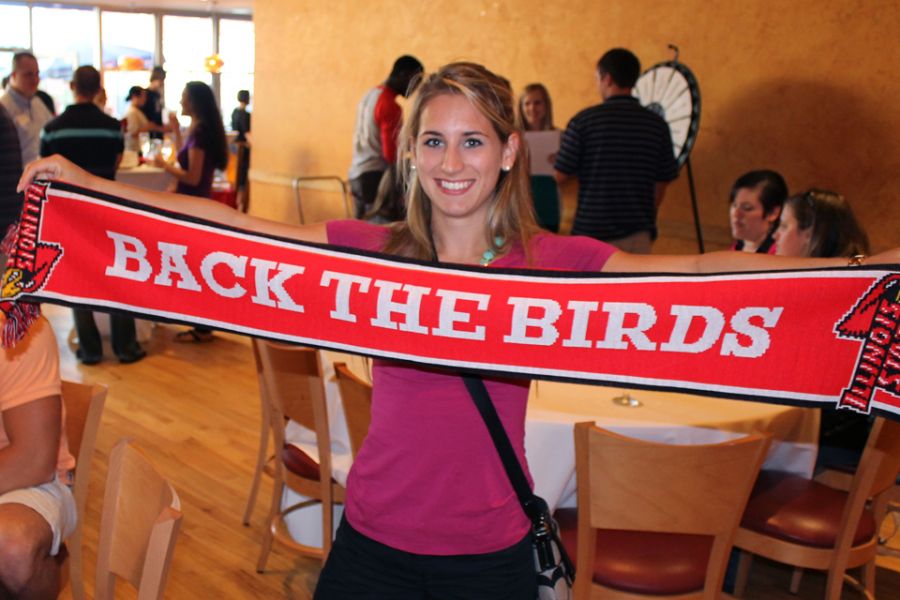 Girl holding Illinois State scarf