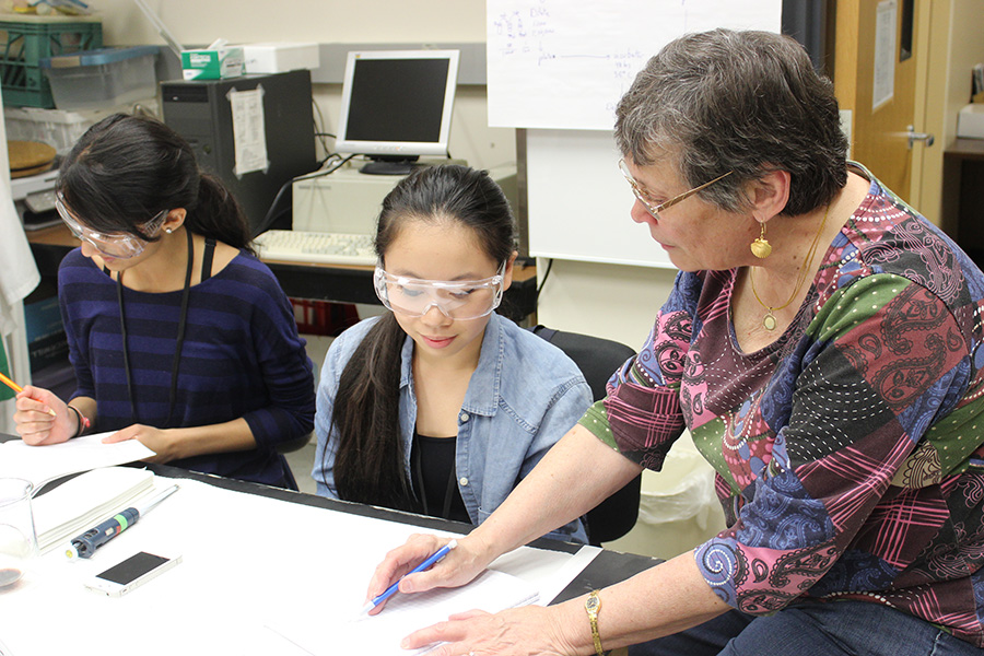 image of Marjorie Jones and students at Research Academy
