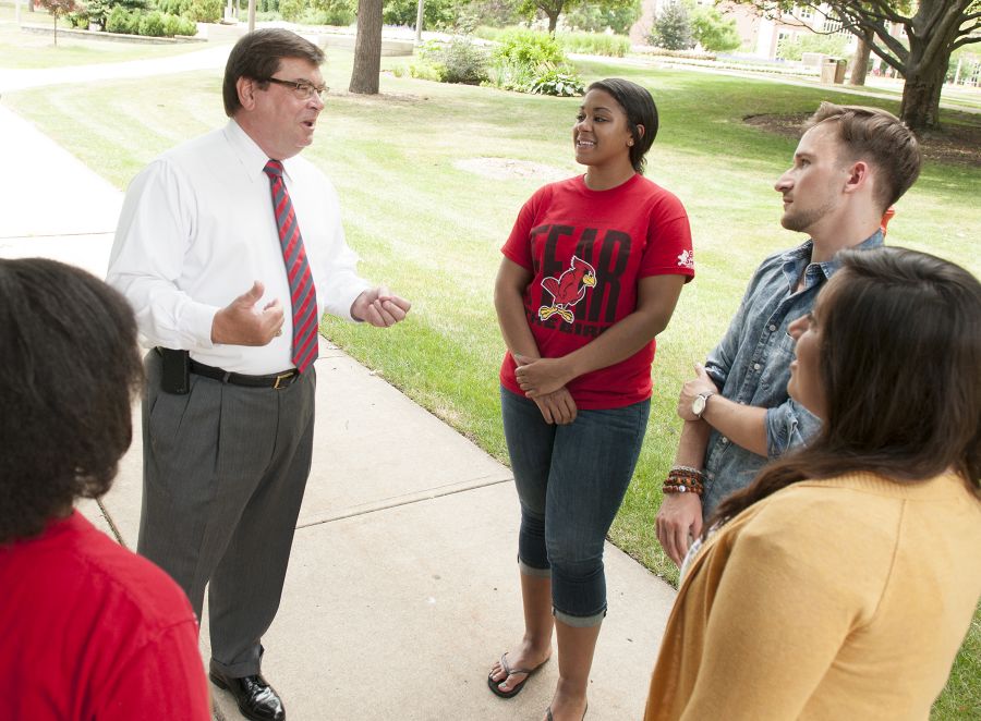 image of President Dietz talked to students on campus.