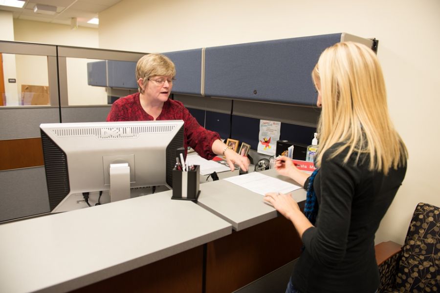 Student Health Insurance representative helps a student file a claim.