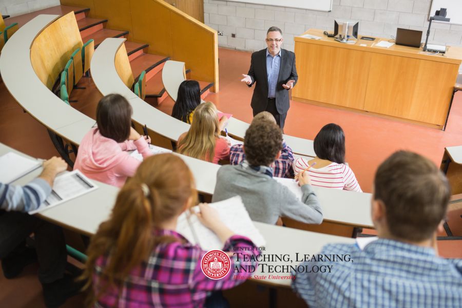 professor teaching in front of large class