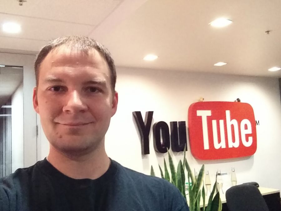Clint Riley '11, at work in the YouTube office .
