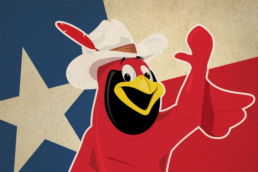 Reggie with cowboy hat on and Texas flag background