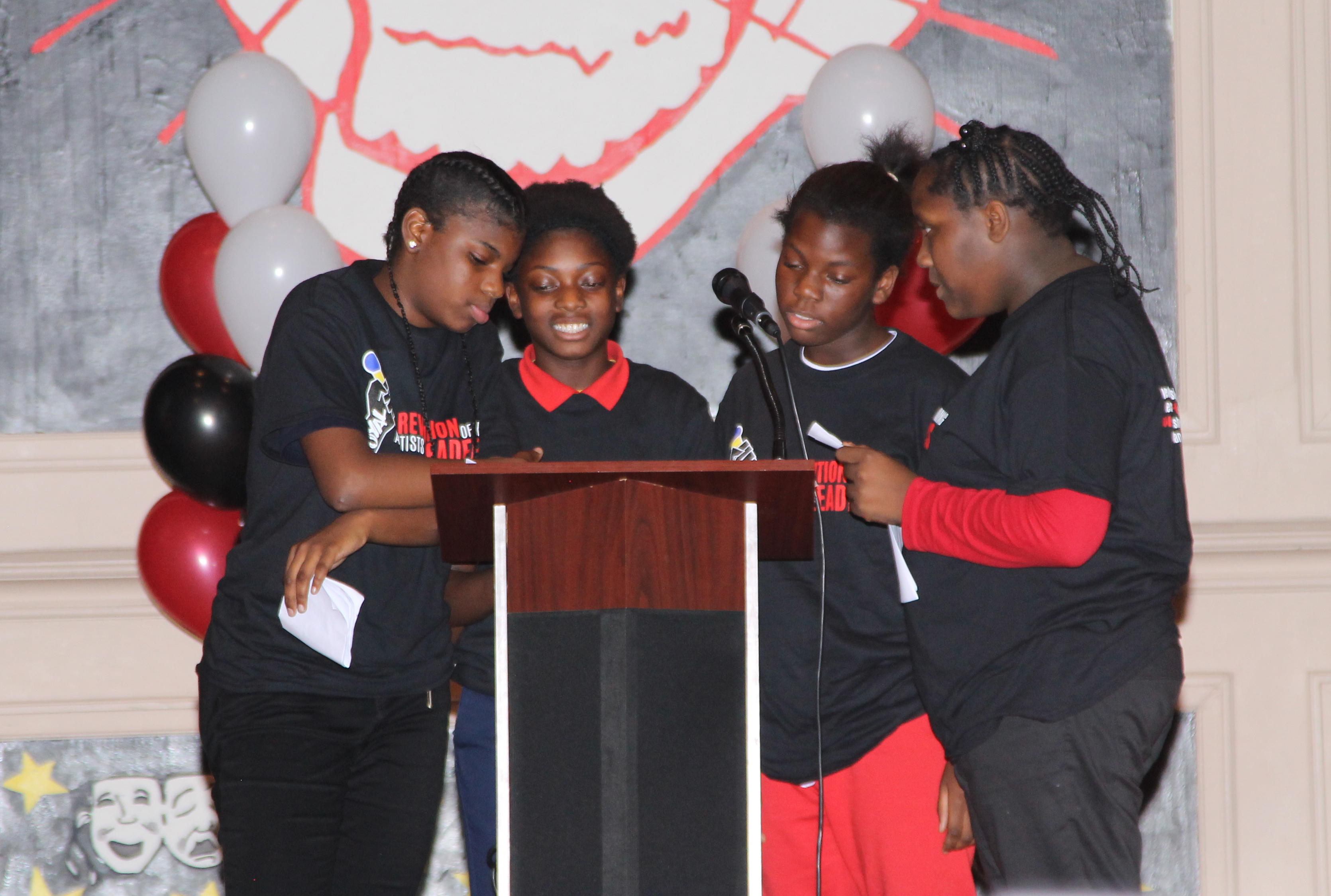 John Cook Elementary students in Auburn Gresham deliver a slam poetry performance in front of a crowd of more than 500 students, faculty, staff, and guests.