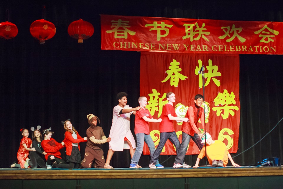 Students performing in a Chinese celebration.