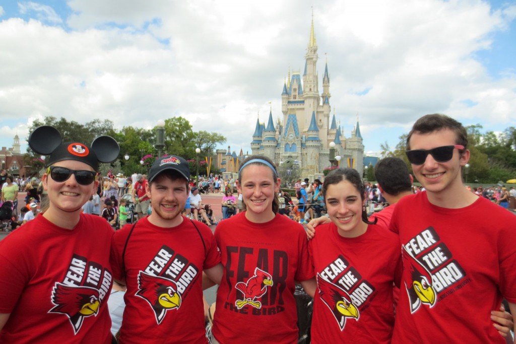 Students wearing their Fear the Bird shirts at Disney World.