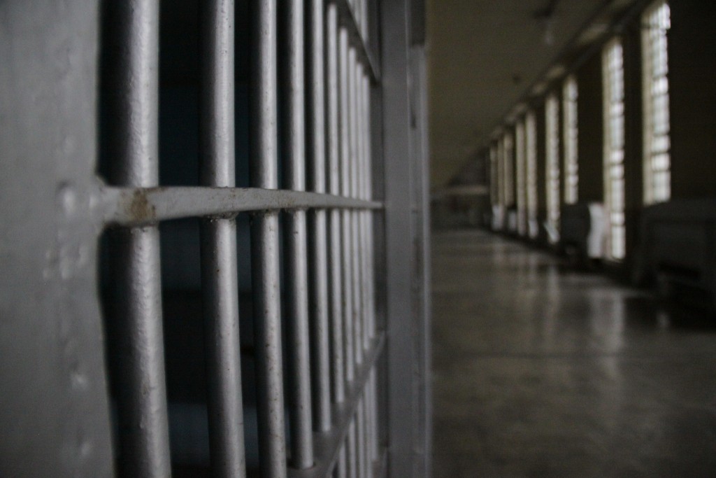 Prison bars in empty cellblock