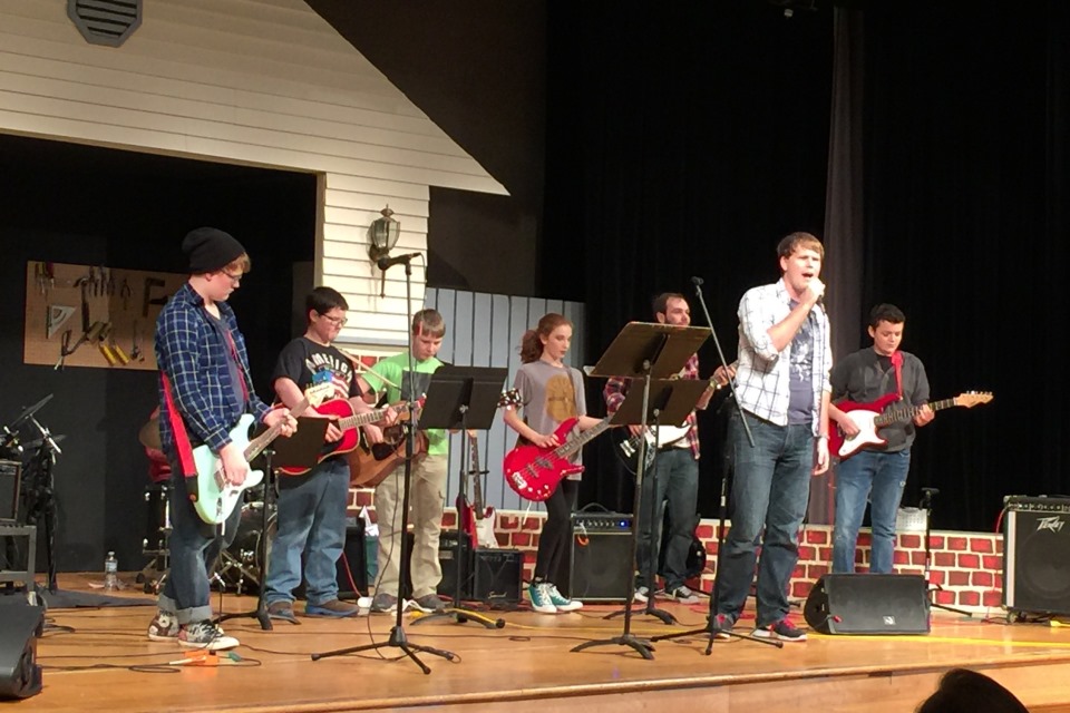 Metcalf students perform with their Rock Band class.