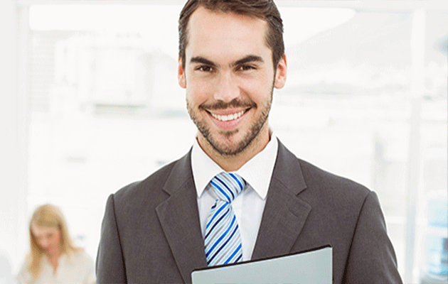 Guy in business suit with resume in hand.