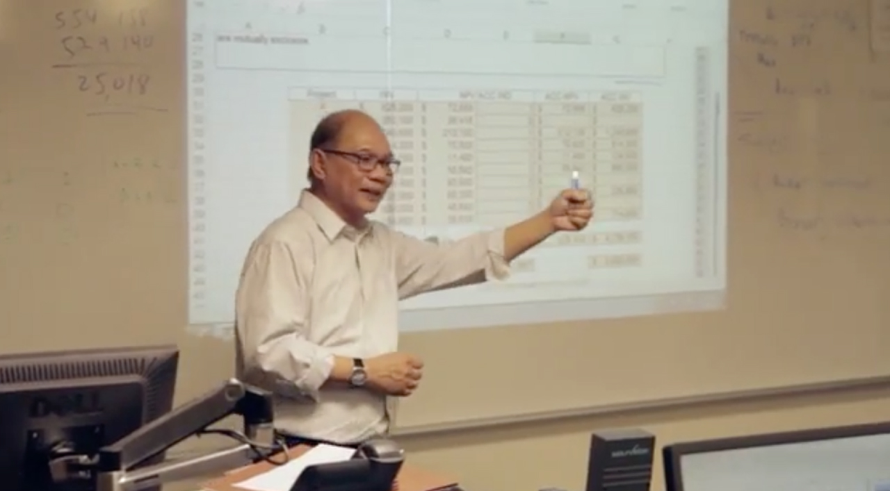 Professor teaching in the actuarial program
