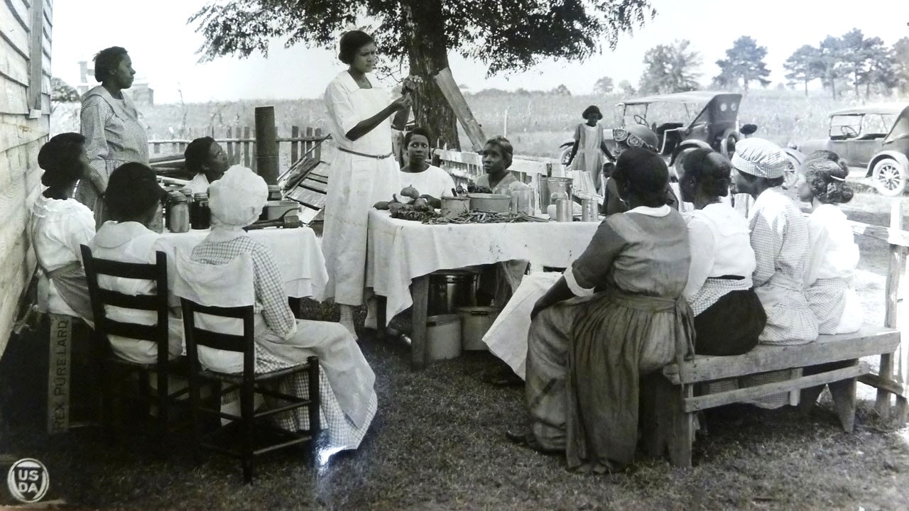image of women on a farm in the early 1900s.