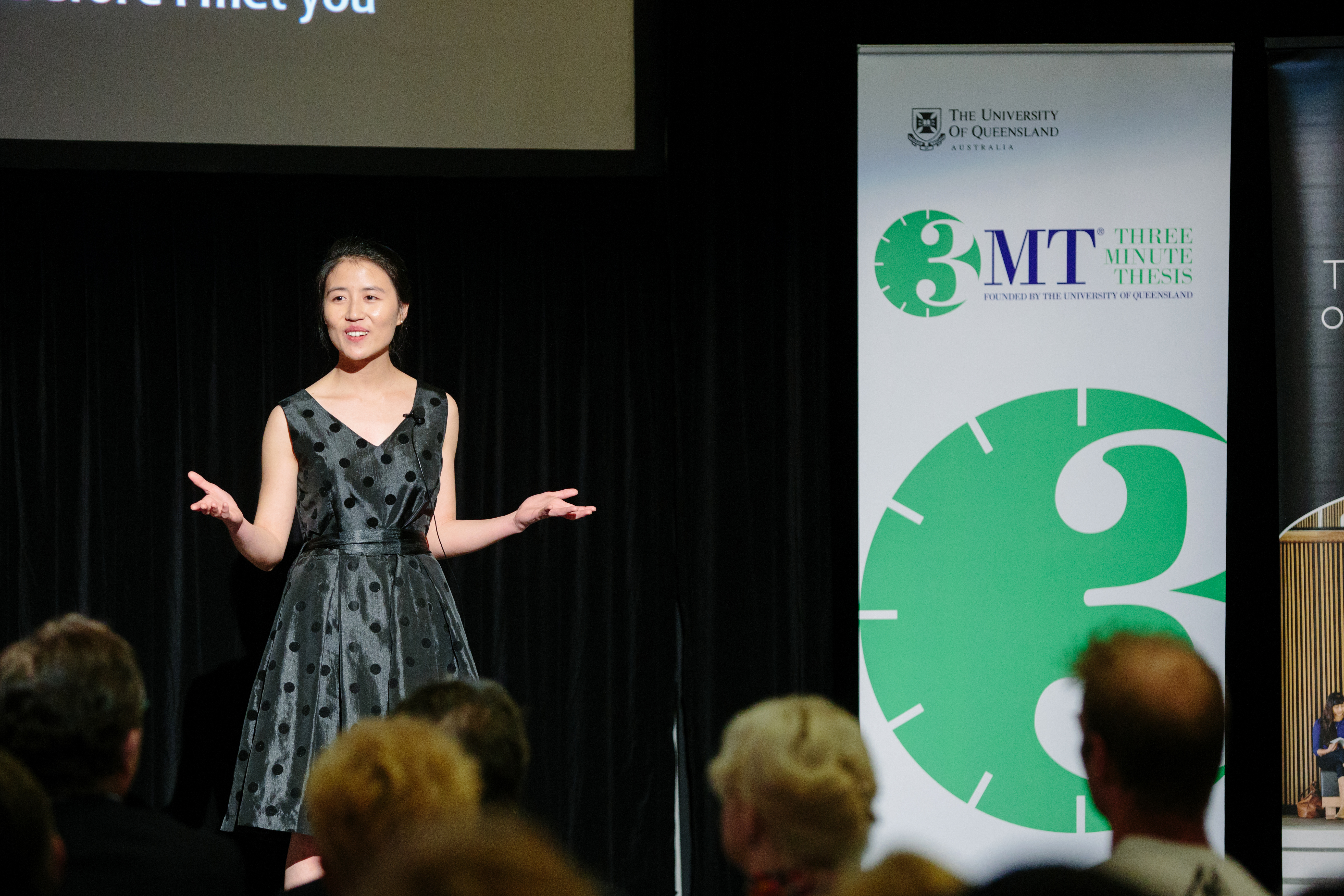 Student presents on the 3MT stage