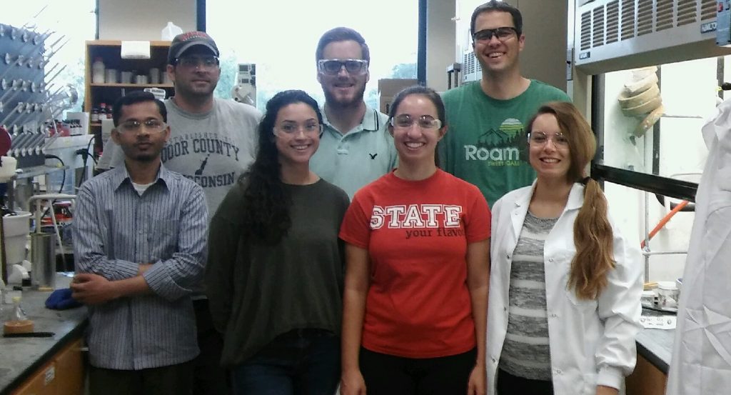 image of Andy Mitchell, top right, and the students of his organic chemistry lab.