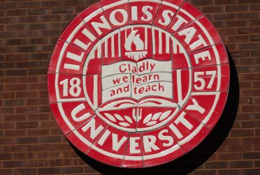 Image of the Illinois State University seal with the words Gladly we learn and teach.