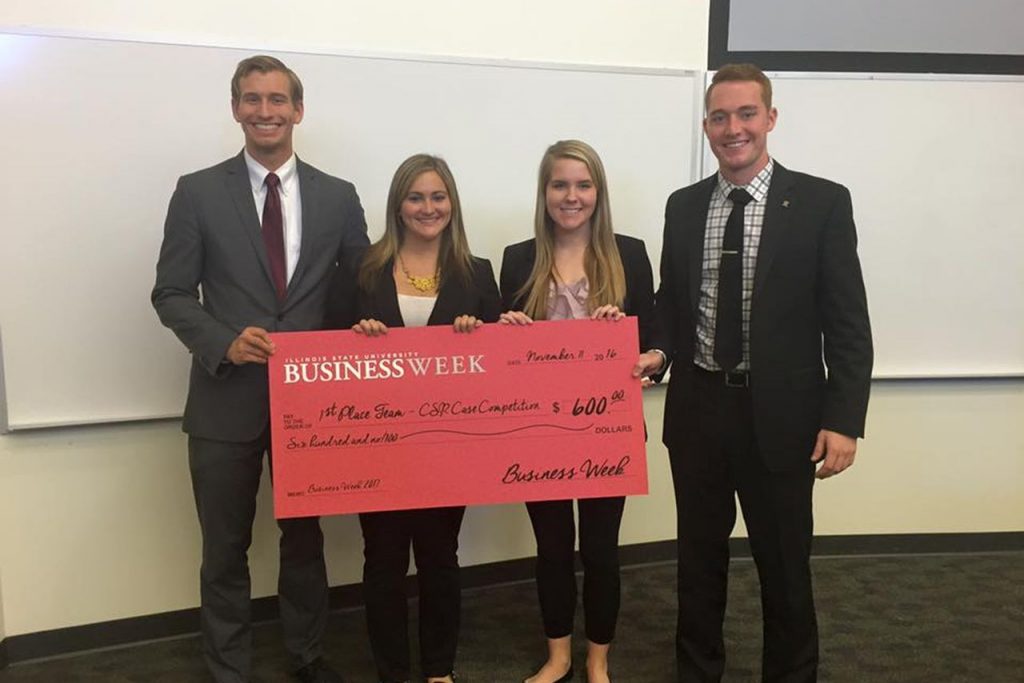 First-place winners of the Corporate Social Responsibility Case Competition sponsored by Caterpillar Inc.: Sean Fitzgerald (left), Morgan Loy, Emily Scaletta, and Scott Piekarski.