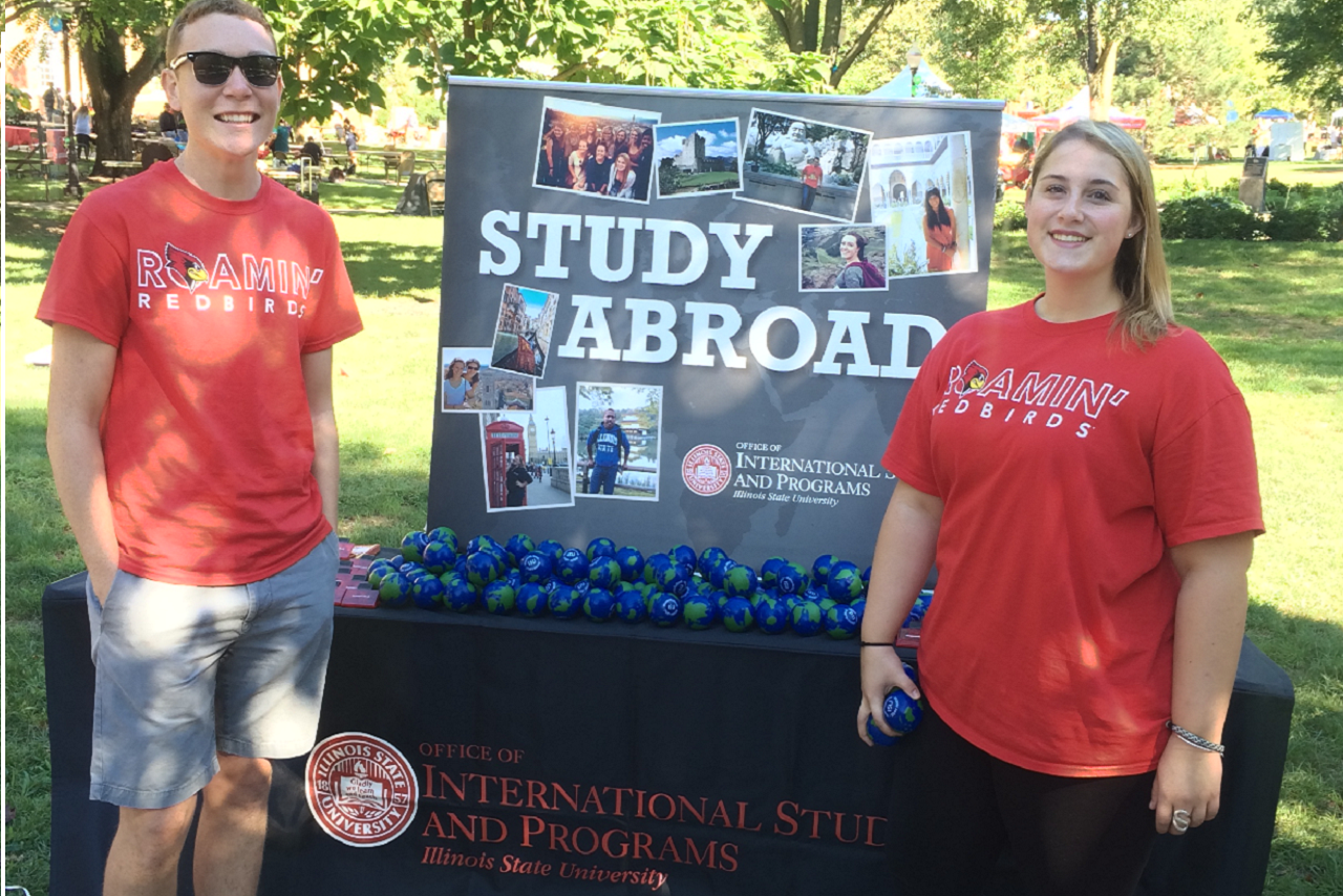 Study Abroad Ambassadors work a table on the Quad