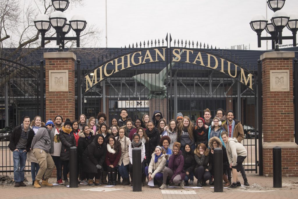 ISU students pose outside Michigan football stadium