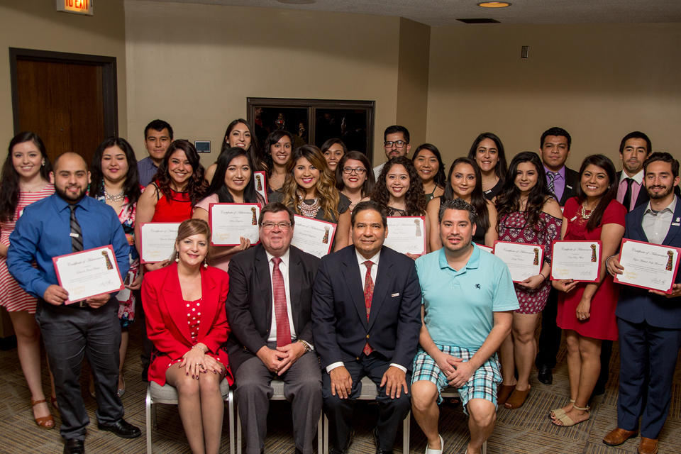 Latino students at graduation ceremony