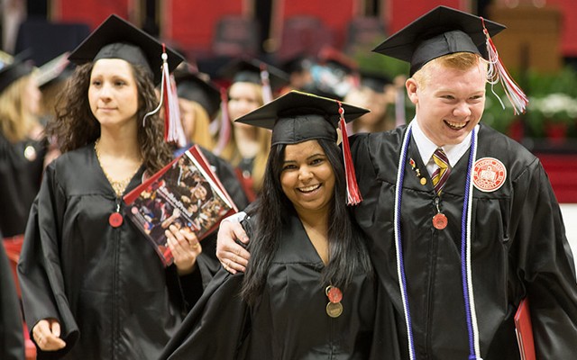 Illinois State graduates celebrate after spring commencement.