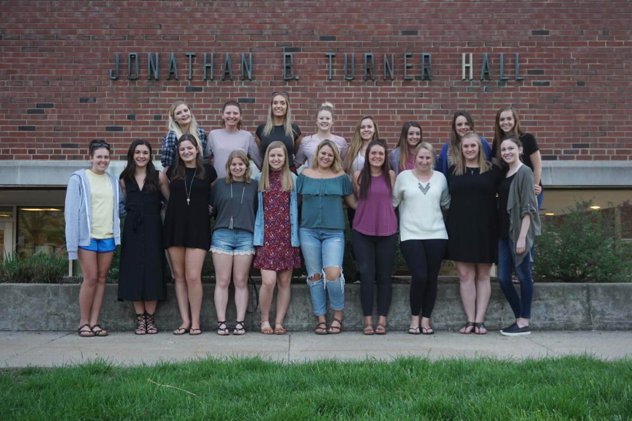 Fashion Design and Merchandising Association students pose for group pic