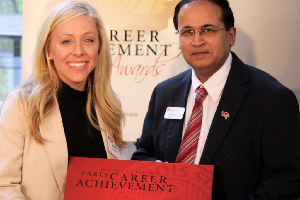 College of Business Dean Ajay Samnant, right, and Melissa Kats ‘11, 2016 Early Career Achievement Award winner.