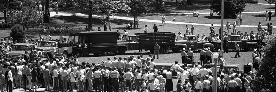 University vehicles formed a barricade around the flagpole on May 19, 1970