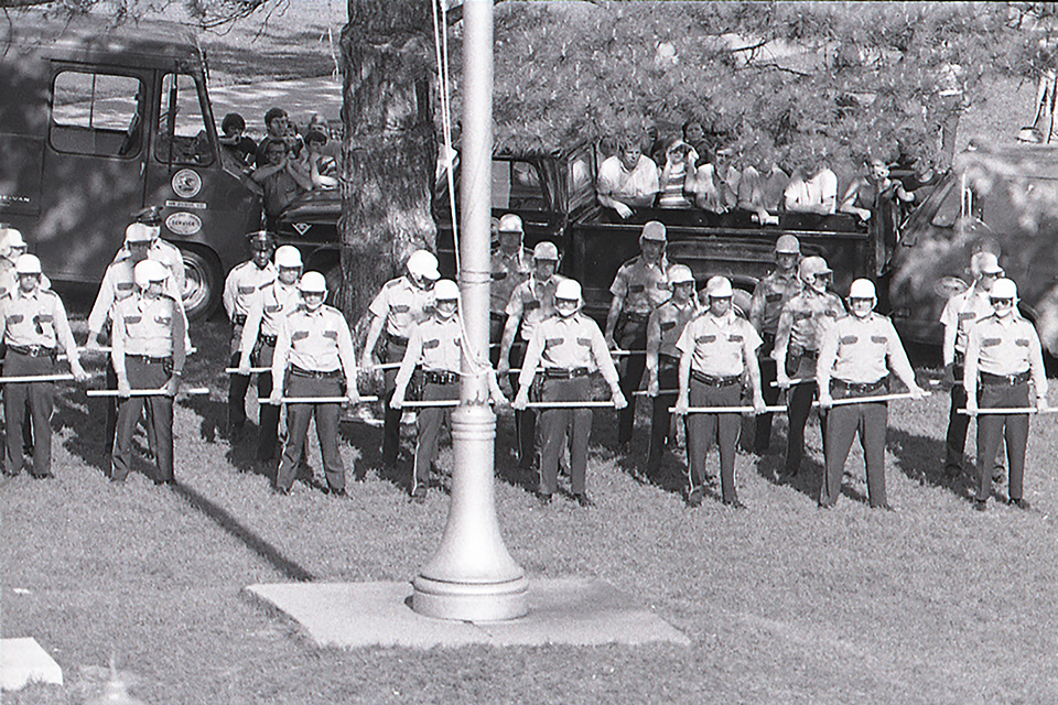 Illinois State Police guard the flagpole on Illinois State’s Quad on May 19, 1970