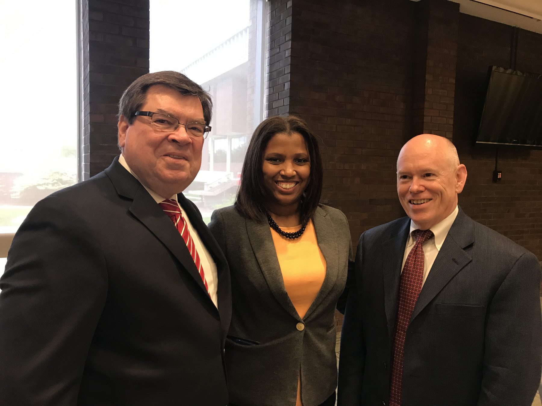 Professors Tiffany Puckett and Thomas McClure (right) with President Larry Dietz