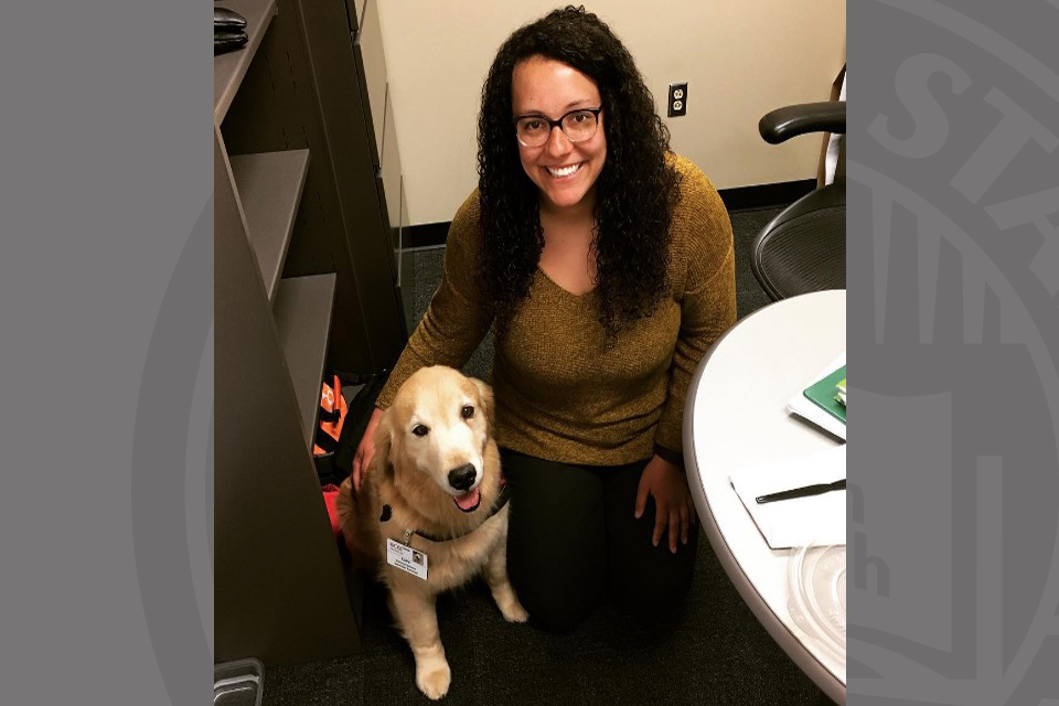 Olivia Butts with therapy dog, Cece