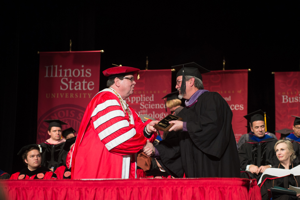 Kentzler accepting his award from Dr. Dietz