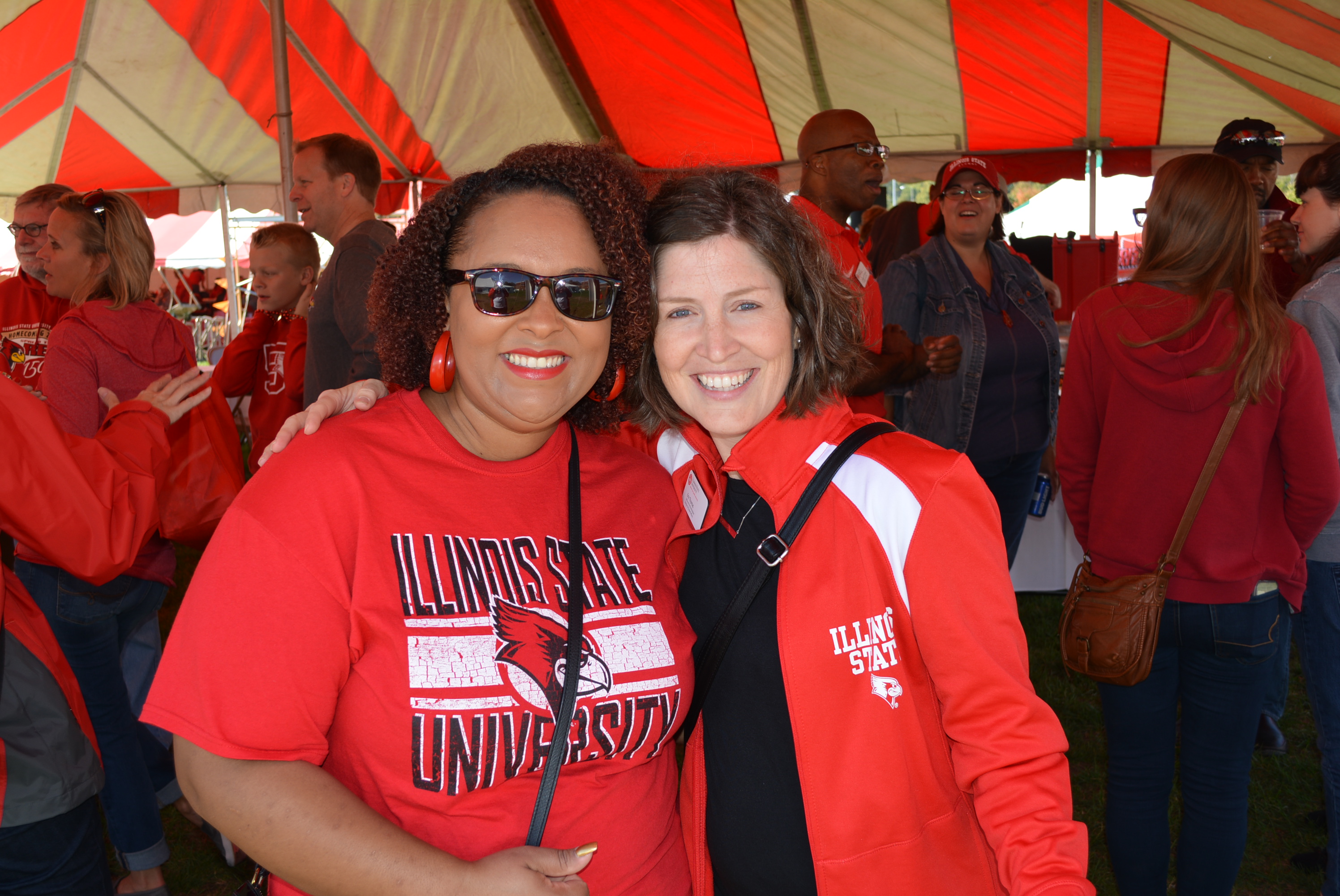 Angell Davis and Erin Thomas at the Student Affairs tent at Homecoming 2016.