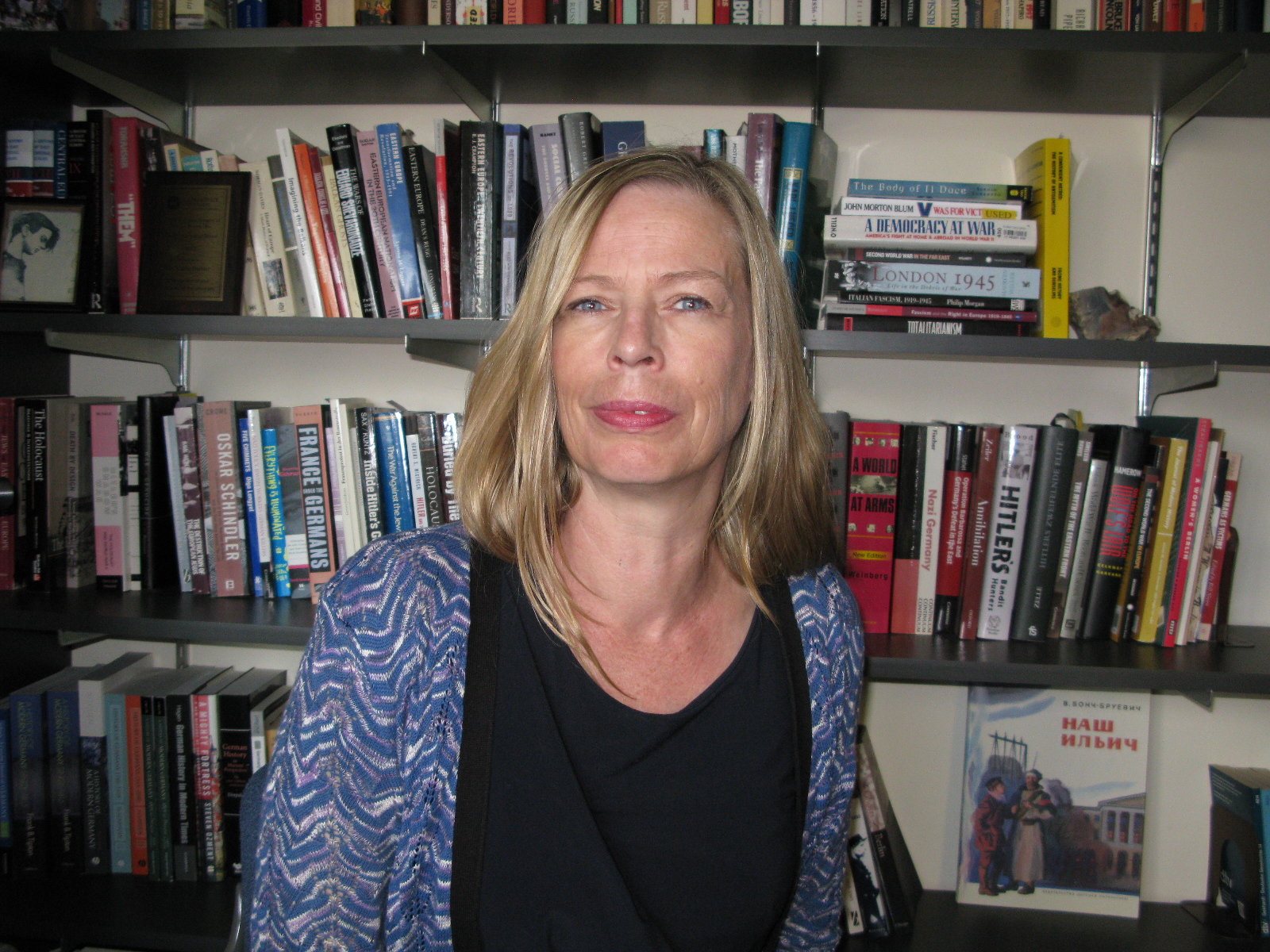 Katrin Paehler in her office, surrounded by books