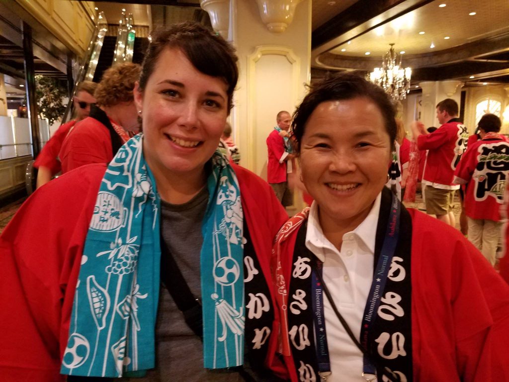 Harriet Steinbach smiling with SIster Cities colleague in Japan