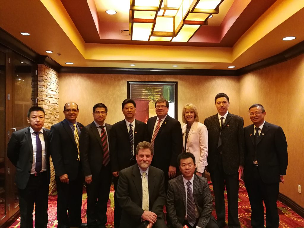 Illinois State's administration meets with representatives from SWU in China.