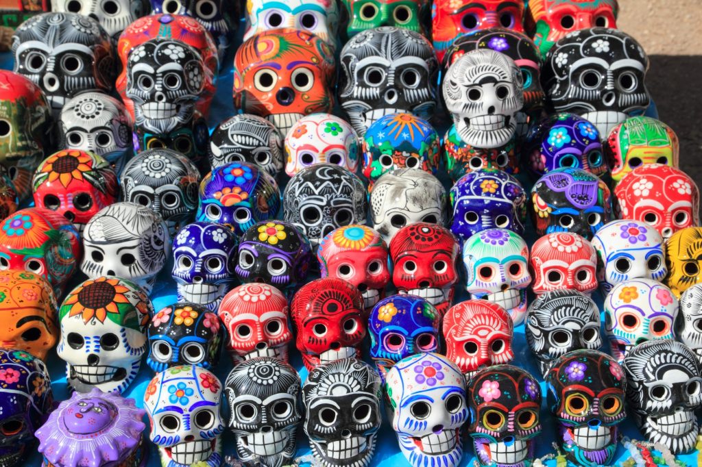 rows of ceramic skulls painted for the Day of the Dead
