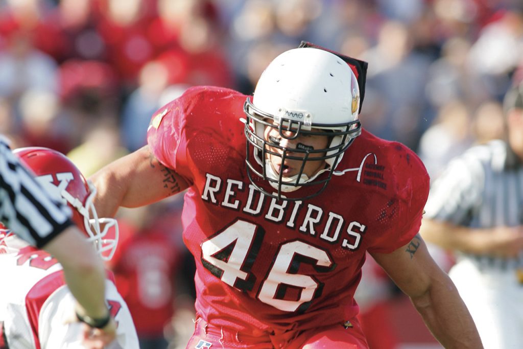 Boomer Grigsby '07 playing football for Redbirds