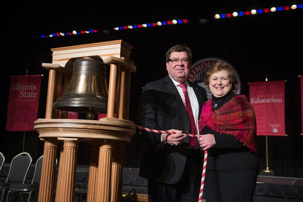 President Larry and First Lady Marlene Dietz prepare to ring the replica of the Founders Bell.